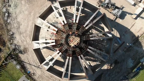 Aerial shot of workers in a construction, structure in the process to be build Stock Footage 142902059