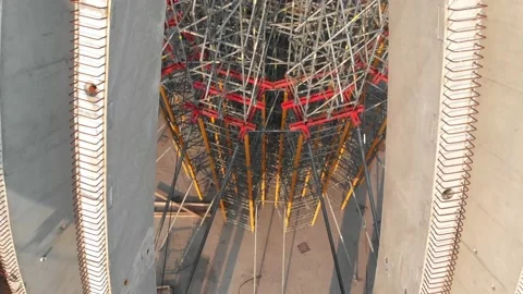 Aerial shot of workers in a construction, structure in the process to be build Stock Footage 142904192