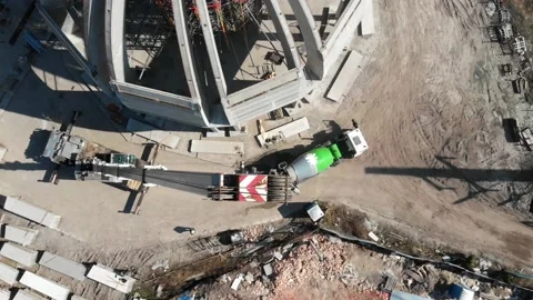 Aerial shot of workers in a construction, structure in the process to be build Stock Footage 142905834