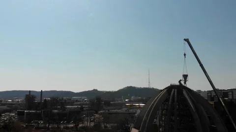 Aerial shot of workers in a construction, structure in the process to be build Stock Footage 142905868