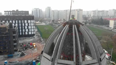 Aerial shot of workers in a construction, structure in the process to be build Stock Footage 142906031