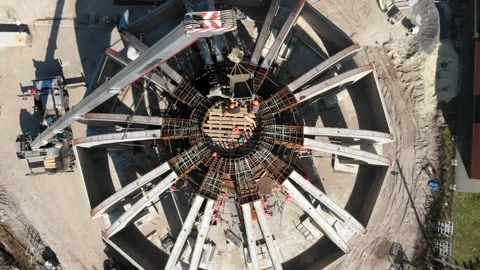 Aerial shot of workers in a construction, structure in the process to be build Stock Footage 142906826