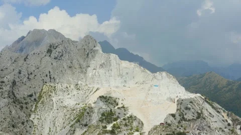 Aerial shot of a working marble quarry in the mountains of Carrara, Italy Stock Footage 248711722