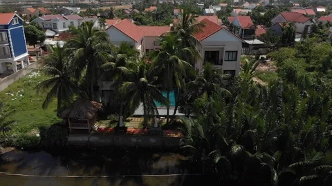 Aerial Shot:pool villa, river view, Vietnam Stock Footage 101724493