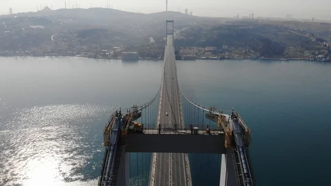 Aerial shots of the Bosphorus Bridge in Istanbul streets after curfew initiated  Stock Footage 128317448