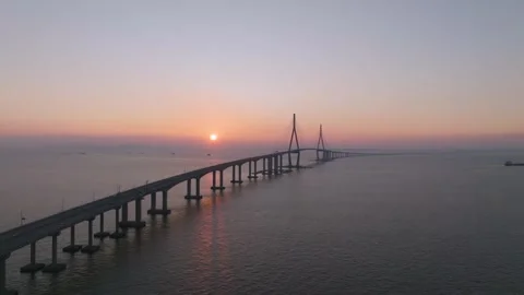 Aerial Side Pass Over Incheon Bridge Traffic at Sunset Stock Footage 344694398