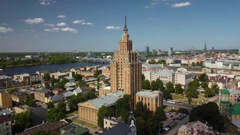 Aerial Side of Soviet Science House in Riga city centre with bridges, June 2023 Stock Footage 277346609