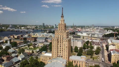 Aerial Side of Soviet Science House in Riga city centre with bridges, June 2023 Stock Footage 277346651