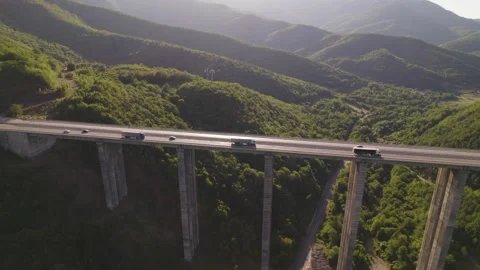 Aerial side view of big viaduct on motorway with beautiful nature Stock Footage 161149960