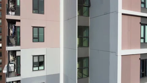 Aerial side view of built modern high-rise apartment building Stock Footage 226529448