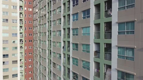 Aerial side view of built modern high-rise apartment building Stock Footage 226529726