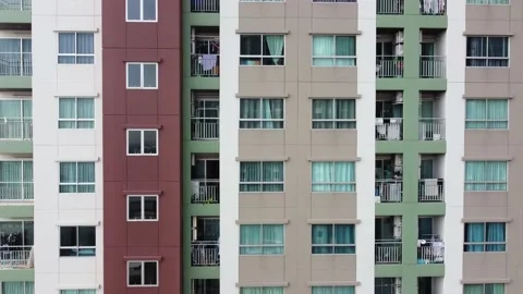 Aerial side view of built modern high-rise apartment building Stock Footage 226530023