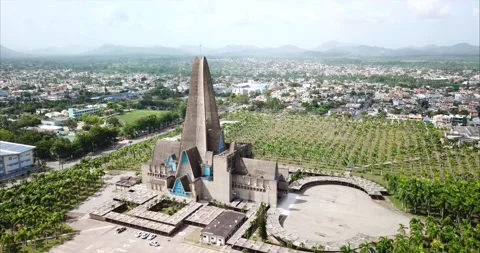 Aerial side view of Catholic minor basilica and cathedral Our Lady of Altagracia Stock Footage 137678232