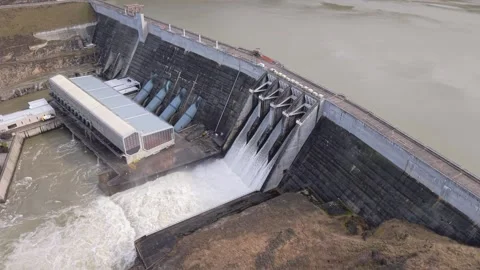 Aerial Side View of Clyde Dam Spill Gates Open on Clutha River, New Zealand Stock Footage 346453314