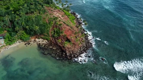 Aerial Side View of Coconut Tree Hill in Mirissa Video stock 313976982