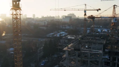 Aerial side view of the construction of a multi-storey apartment building Stock Footage 167438567
