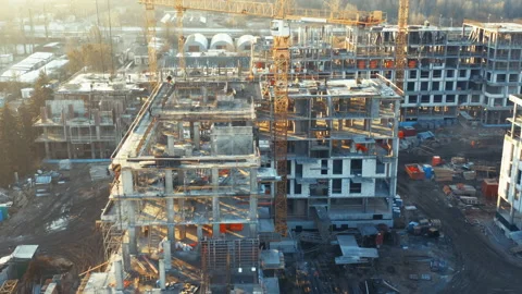 Aerial side view of the construction of a multi-storey residential building Stock Footage 167439844