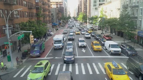 Aerial side view flyover of Manhattan street traffic - 4K Stock Video Stock Footage