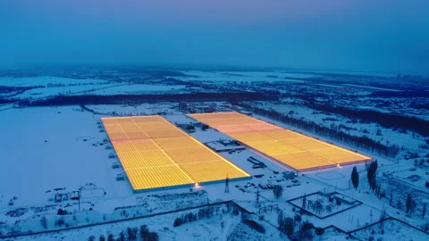 Aerial side view of large industrial greenhouses for growing plants in winter 스톡 동영상 149587461