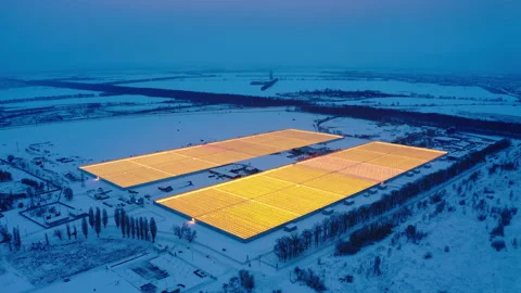 Aerial side view of large industrial greenhouses for growing plants in winter 스톡 동영상 149653561