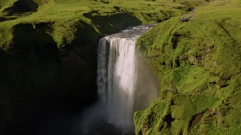 Aerial Side View of Skogafoss Waterfall in South Iceland 4K Drone Footage Stock Footage 341578548