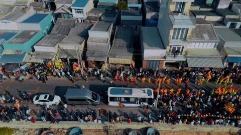 Aerial sideway: Dragon and lion dance at Nghinh Ong Festival, Vietnam Stock Footage 334452367
