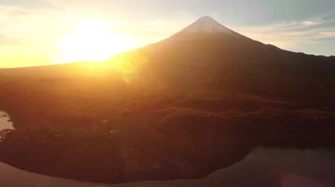 Aerial: Silhouette of Volcano During Sunset Tracking Shot Patagonia Chile 2K Stock Footage