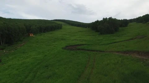Aerial of ski resort in summer, alpine meadow Stock Footage 59551667