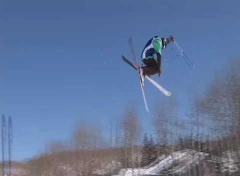 Aerial Ski Trick 360 Tip Grab in Snowmass, Colorado 2012 Video stock 219980656