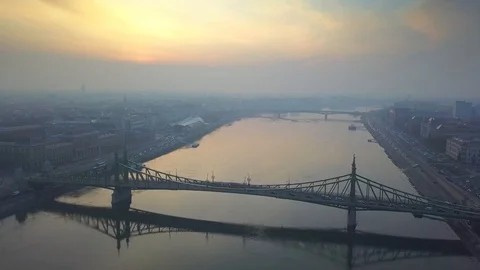 Aerial skyline view about drone flying over of Liberty Bridge at sunrise Stock Footage 85703256