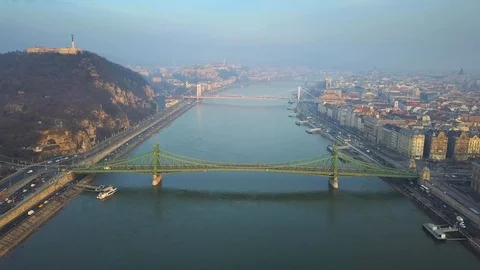 Aerial skyline view about drone flying over of Liberty Bridge at sunrise Stock Footage 85703477