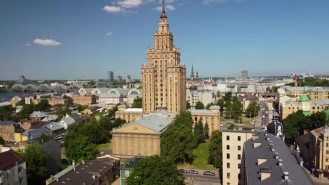 Aerial slide backwards Soviet Science house in Riga city centre, June 2023 Stock Footage 277346456