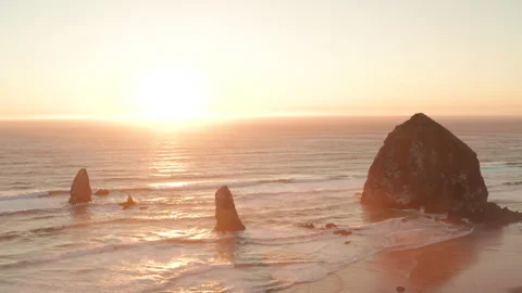 Aerial slider shot of Haystack rock at sunset Stock Footage 250065070