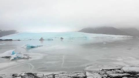 Aerial slow motion rising view Fjallsjokull glacier. The wonderful glacier .. Stock Footage 257026257