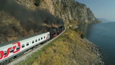 Aerial slow motion train smoke steam loc... | Stock Video | Pond5