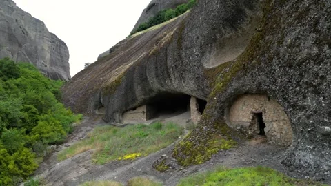 Aerial Slow Move in Meteora, Greece Hermit Caves of Badovas Day. Church Anc.. Stock Footage 334898093