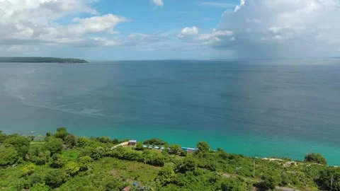 Aerial Slow Pan Left Over Tropical Coastal Seascape 4k Stock Footage 337638998