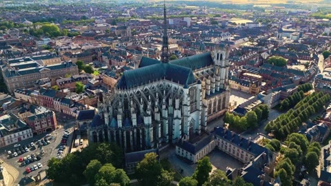 Aerial slow panning elevated wide angle drone view of the Notre Dame D'amiens Stock Footage 341314991