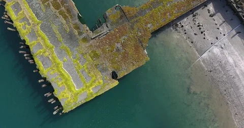Aerial Slow Push Over Abandoned Pier Stock Footage 86663549
