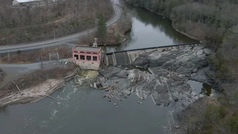 Aerial of Small Hydropower Dam, Waterfall, Logs and Debris on Wallkill River NY Video stock 172270626