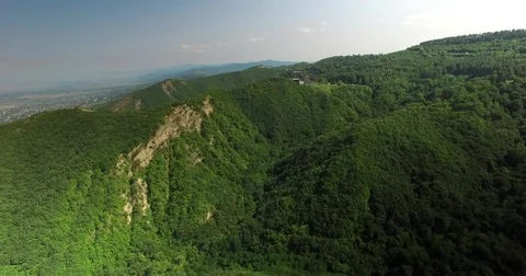 Aerial: Small town on the mountain Stock Footage 75312865