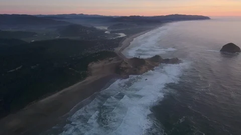 Aerial of a Small Town on the Oregon Coast at Sunset Stock Footage