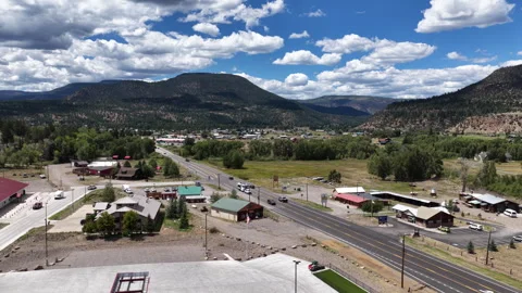 Aerial of small town South Fork Colorado commercial corridor on highway 149 Stock Footage 342747772