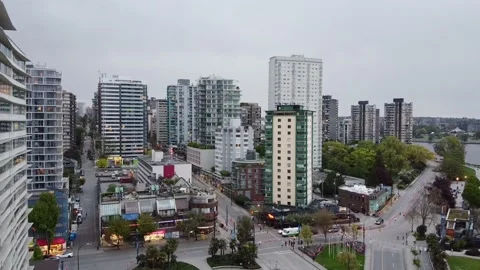 Aerial smooth drop over Physical Distancing forked road while restrictions Stock Footage 135304640