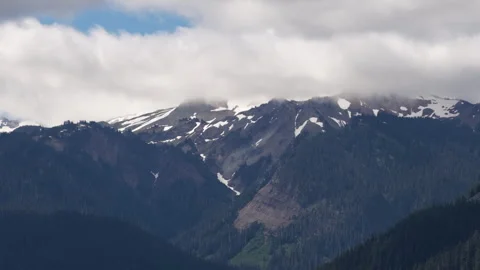 Aerial of snow capped Cascade Mountains in Gifford Pinchot National Forest Stock-Footage 339355821