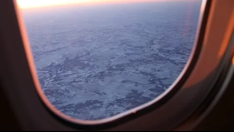 Aerial Snow Plaines Through Window 動画素材 1075362