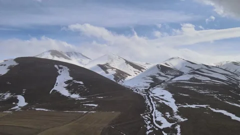 Aerial snowy mountains Video stock 240121170