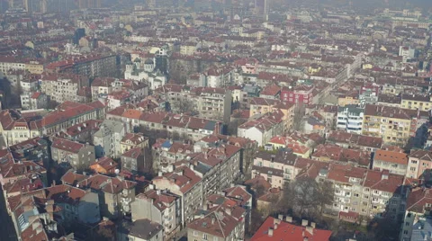 Aerial Sofia Bulgaria city center buildings roofs camera going down Stock Footage