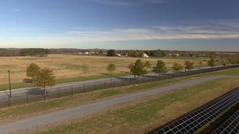 Aerial of Solar Panels in Field Stock Footage 75798570