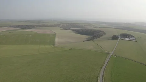Aerial of the South Downs near Ringmer, England. Stock Footage 129884635